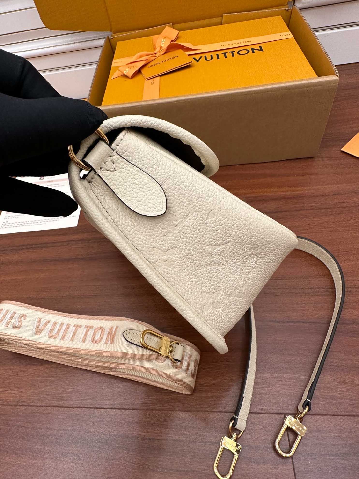 LV Diane Monogram Empreinte Leather