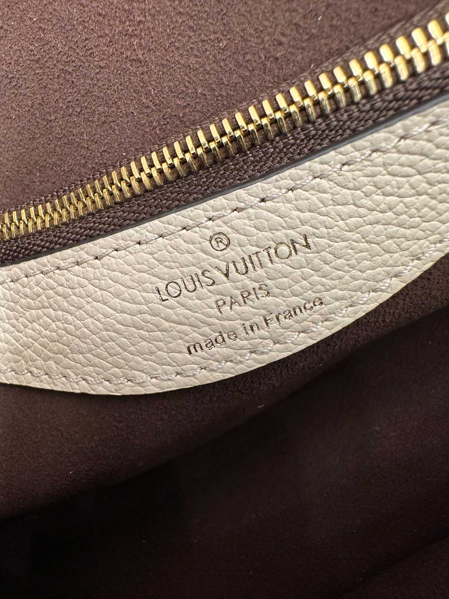 LV Diane Monogram Empreinte Leather