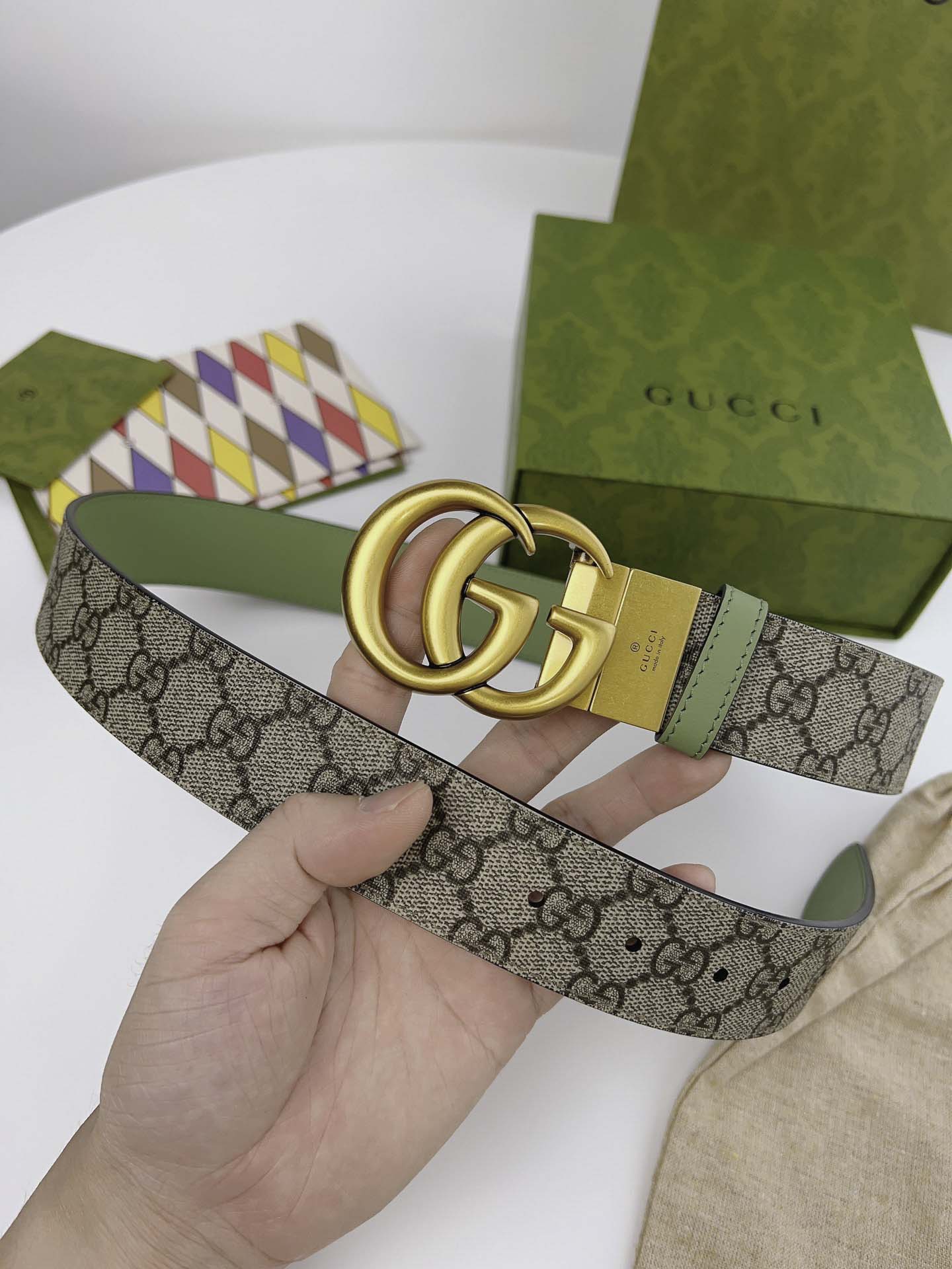 Thắt Lưng Nam Gucci Màu Xanh In Họa Tiết Dập Khóa Kép Vàng